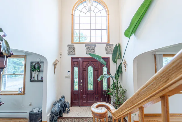 a view of a dining room with furniture window and outside view