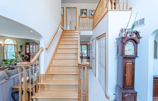 a bedroom with furniture and a window