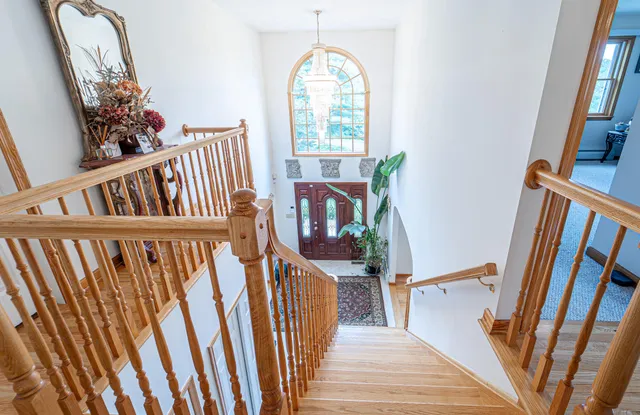 a bedroom with furniture and a bed