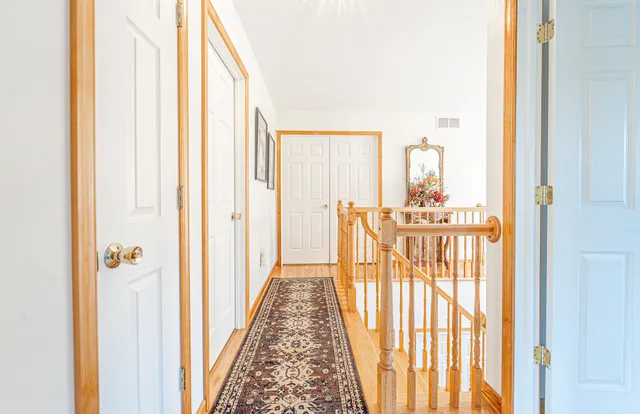 a view of a house with a yard porch and sitting area