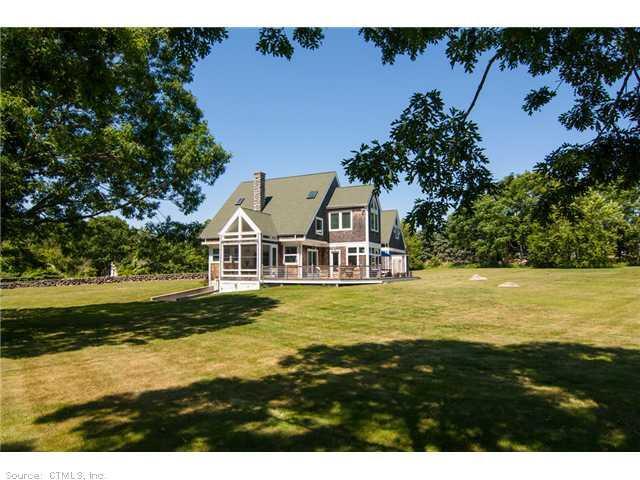 a view of a house with a big yard