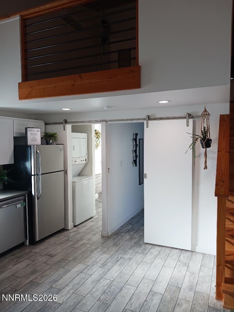 831 Ryland Street Reno, NV 89502 - Photo 4 of 26 a view of a refrigerator and storage in a room