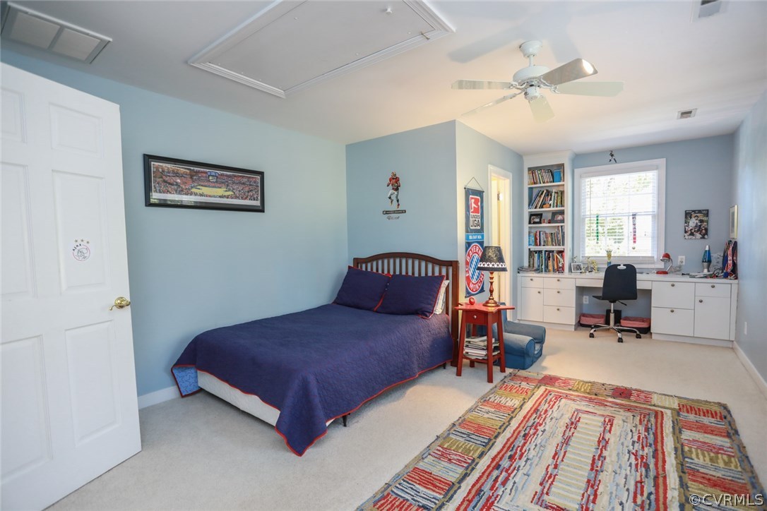8708 River Road Richmond, VA 23229 - Photo 33 of 43 Bedroom Four with built-in desk and bookcase.
