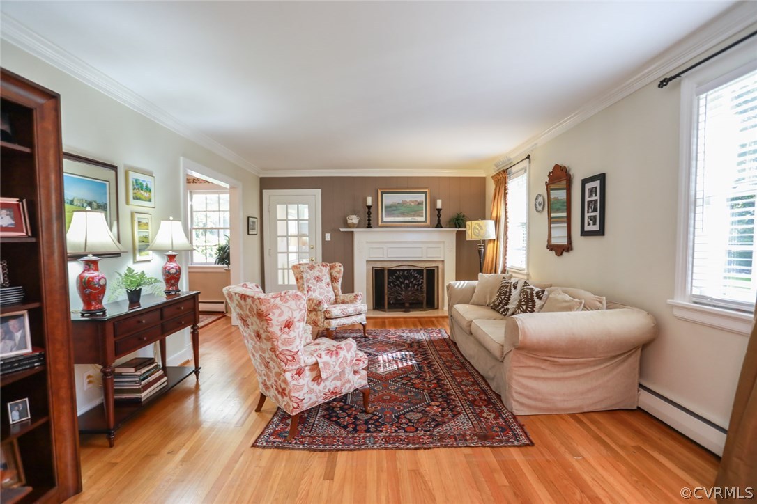 8708 River Road Richmond, VA 23229 - Photo 6 of 43 Living Room features a gas log fireplace, is open