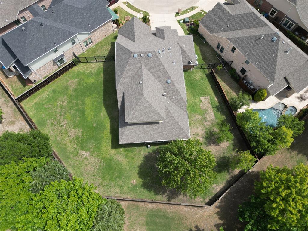 401 Varnum Way Fairview, TX 75069 - Photo 4 of 33 an aerial view of a house with a yard and garden