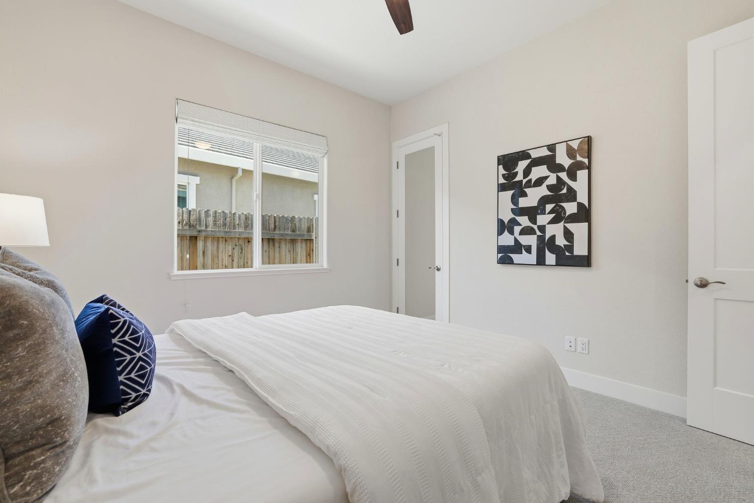 2121 Arbor Rdg Drive Roseville, CA 95747 - Photo 21 of 83 a bedroom with a bed and a window