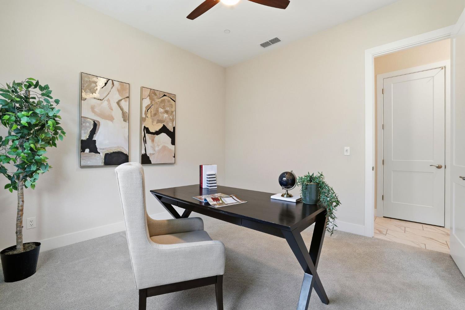 2121 Arbor Rdg Drive Roseville, CA 95747 - Photo 23 of 83 a table and a vase with flowers sitting on a table