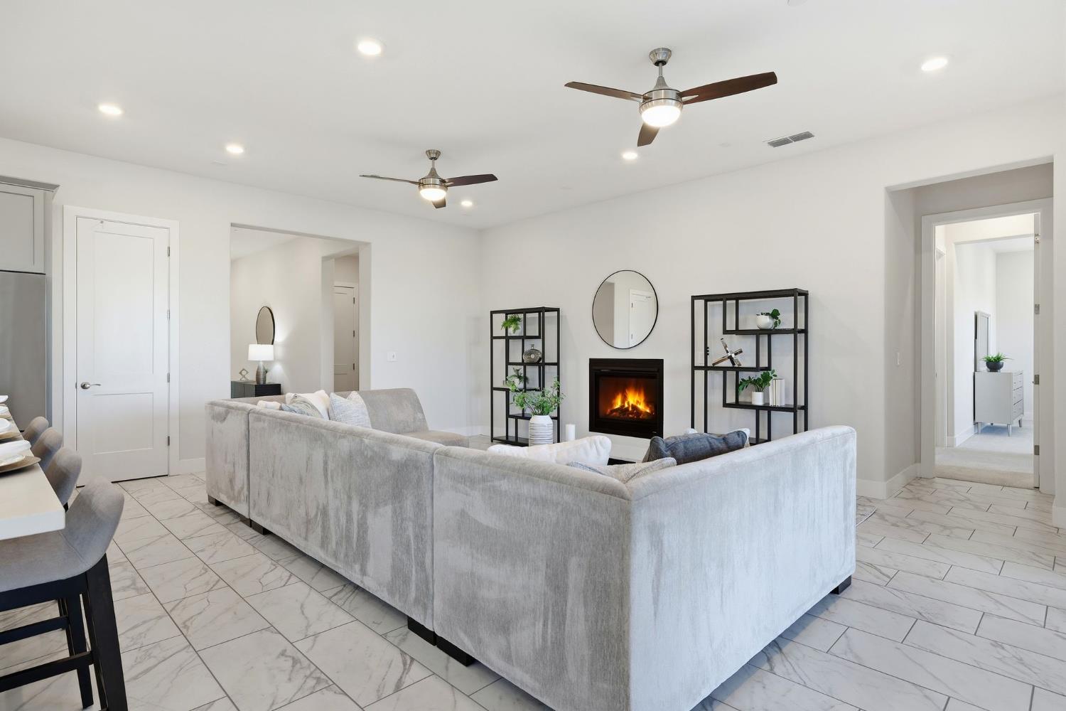 2121 Arbor Rdg Drive Roseville, CA 95747 - Photo 30 of 83 a living room with furniture and a fireplace