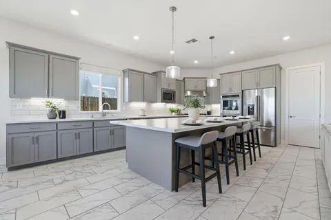 a outdoor space with patio couch and a potted plant