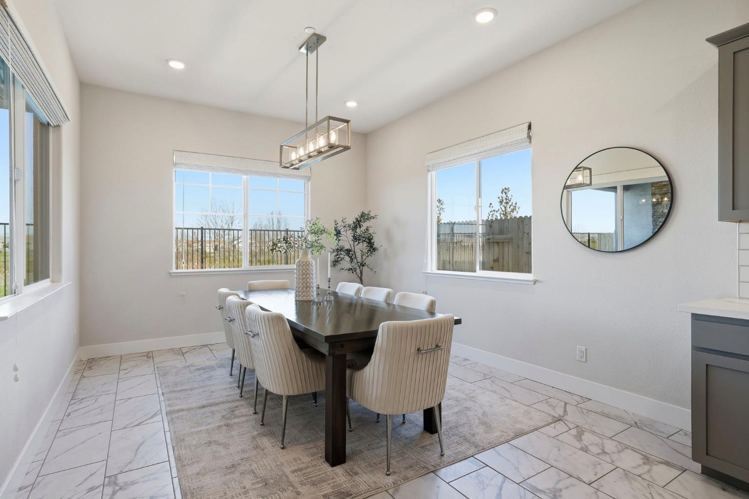 2121 Arbor Rdg Drive Roseville, CA 95747 - Photo 46 of 83 a view of a dining room with furniture window and wooden floor