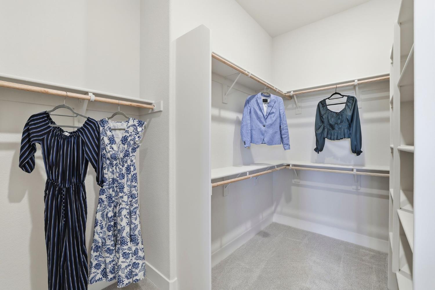 2121 Arbor Rdg Drive Roseville, CA 95747 - Photo 53 of 83 a view of walk in closet with clothes and shoes