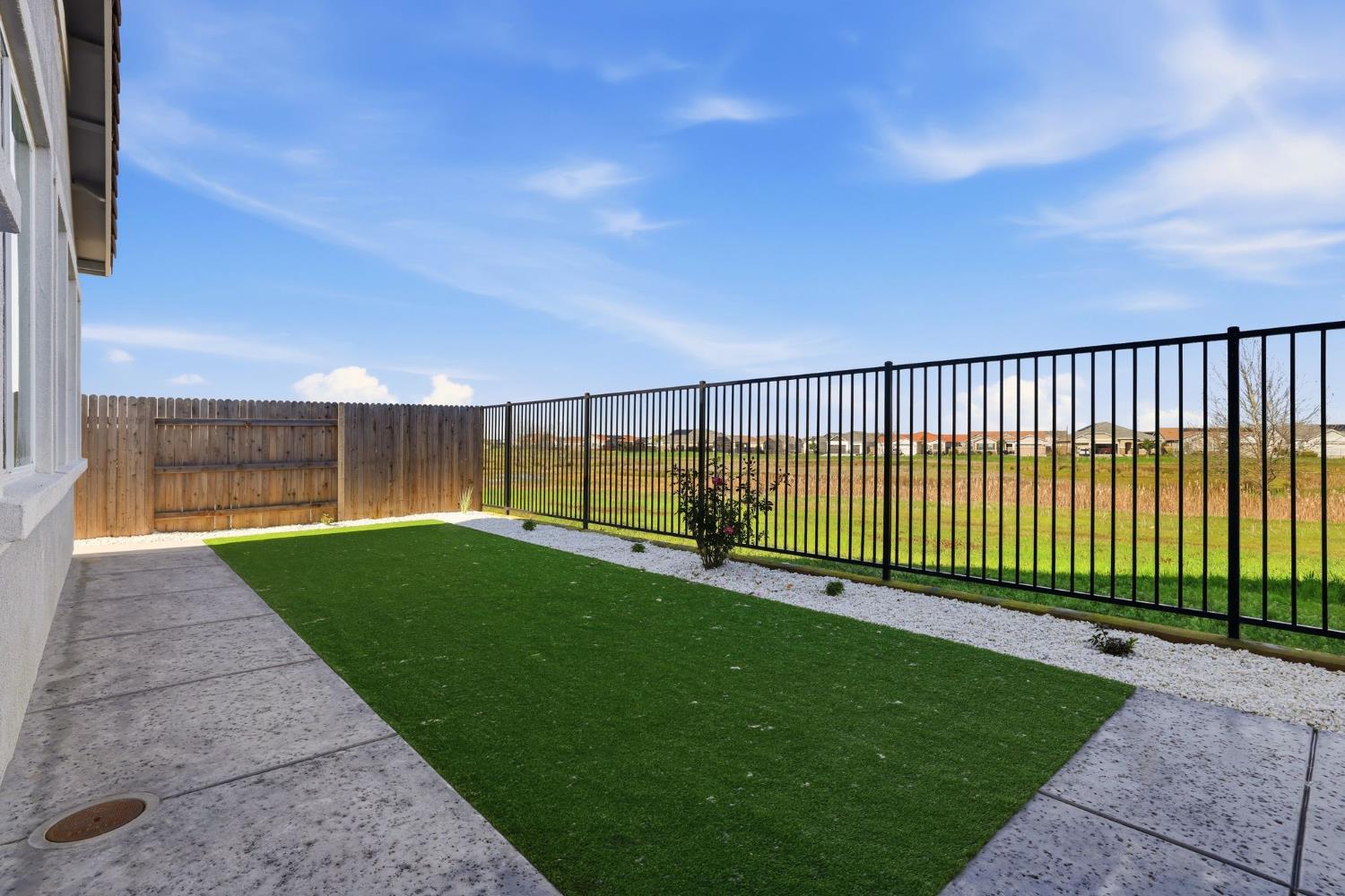 2121 Arbor Rdg Drive Roseville, CA 95747 - Photo 66 of 83 a view of a backyard with a garden