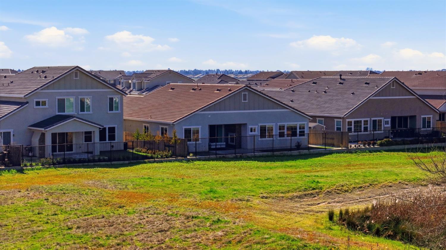 2121 Arbor Rdg Drive Roseville, CA 95747 - Photo 74 of 83 a view of a big house with a big yard and large tree