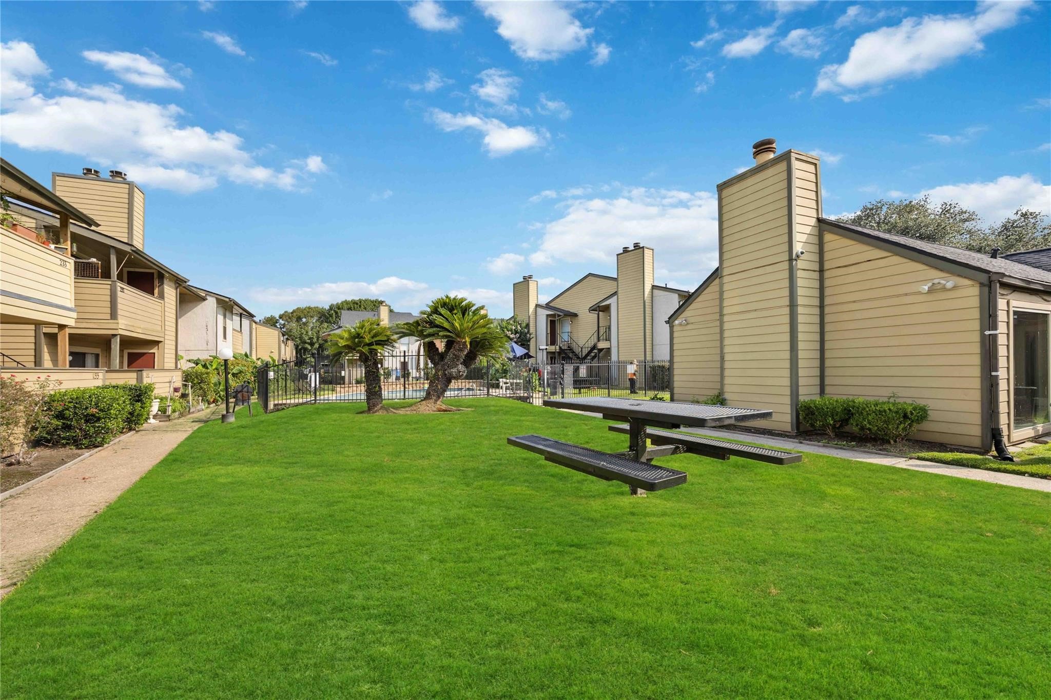 15534 Zabolio Drive, Unit 241 Houston, TX 77598 - Photo 20 of 21 a park view with a garden