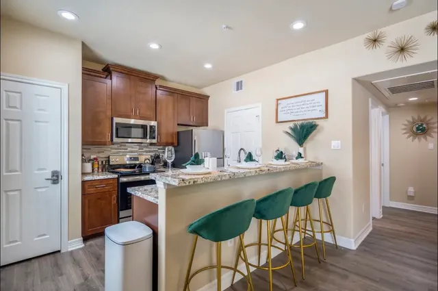 a close view of a kitchen counter space and a sink