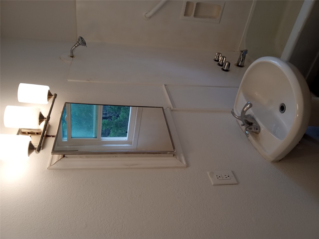 1505 Oreilly Court, Unit C Austin, TX 78734 - Photo 15 of 19 Full bathroom featuring shower / bath combination and a sink