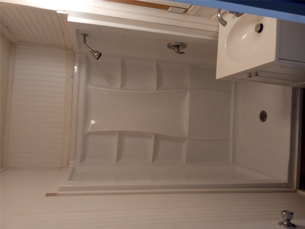 1505 Oreilly Court, Unit C Austin, TX 78734 - Photo 16 of 19 Full bath with a shower and vanity