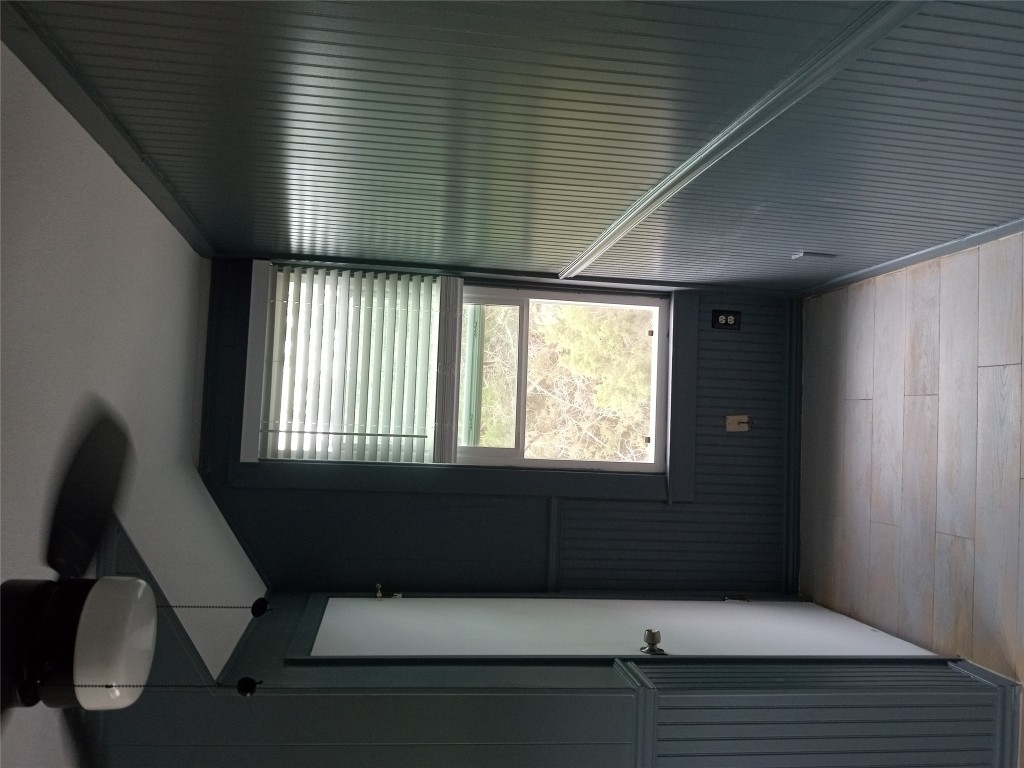 1505 Oreilly Court, Unit C Austin, TX 78734 - Photo 6 of 19 Unfurnished room featuring light wood-type flooring