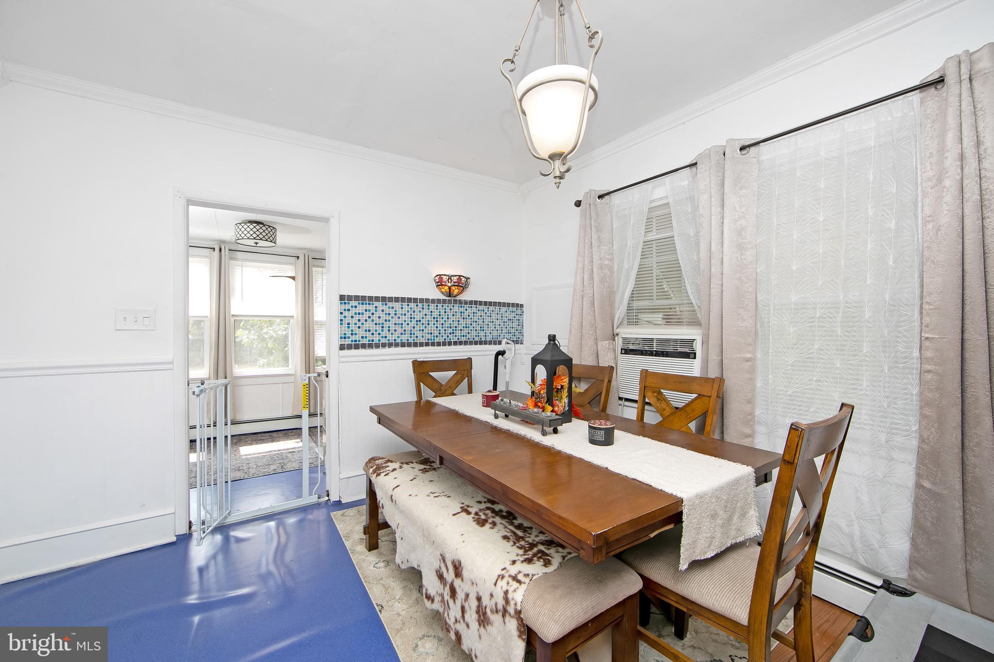 109 Rena Street Newfield, NJ 08344 - Photo 8 of 38 a view of a dining room with furniture window and wooden floor