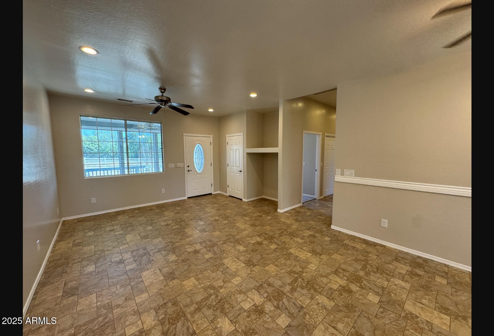 505 Raysun Lane Camp Verde, AZ 86322 - Photo 14 of 50 an empty room with a empty space and windows