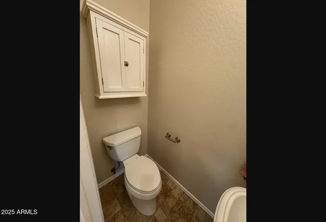 a bathroom with a toilet