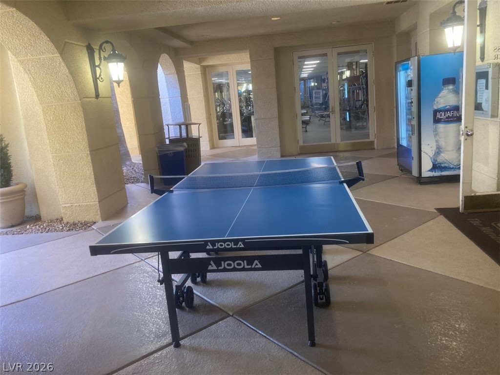210 East Flamingo Road, Unit 137 Las Vegas, NV 89169 - Photo 27 of 32 An inviting outdoor lounge space offers recreation and convenience with ping pong.