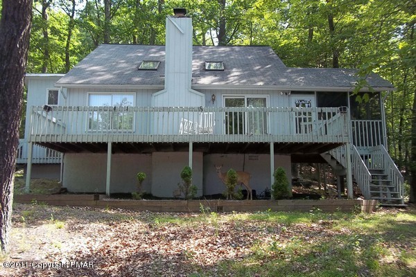 2721-19 Radcliff Road Bushkill, PA 18324 - Photo 1 of 19 a front view of house with a garden