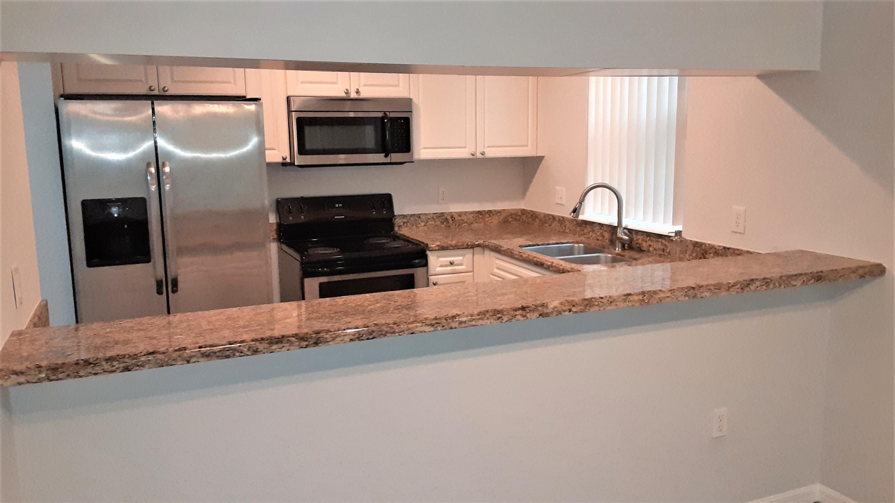 6946 West Sample Road, Unit 6946 Pompano Beach, FL 33063 - Photo 10 of 35 kitchen