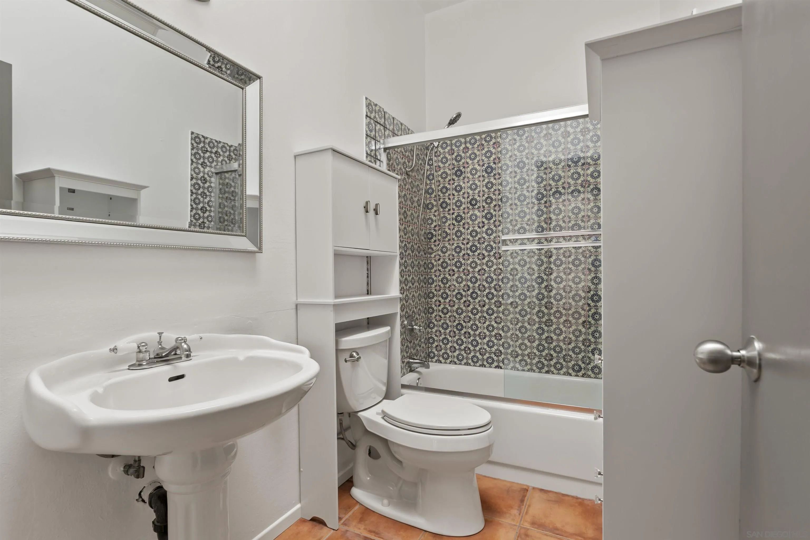 8328 Regents Road, Unit 3G San Diego, CA 92122 - Photo 22 of 39 a bathroom with a sink toilet and shower