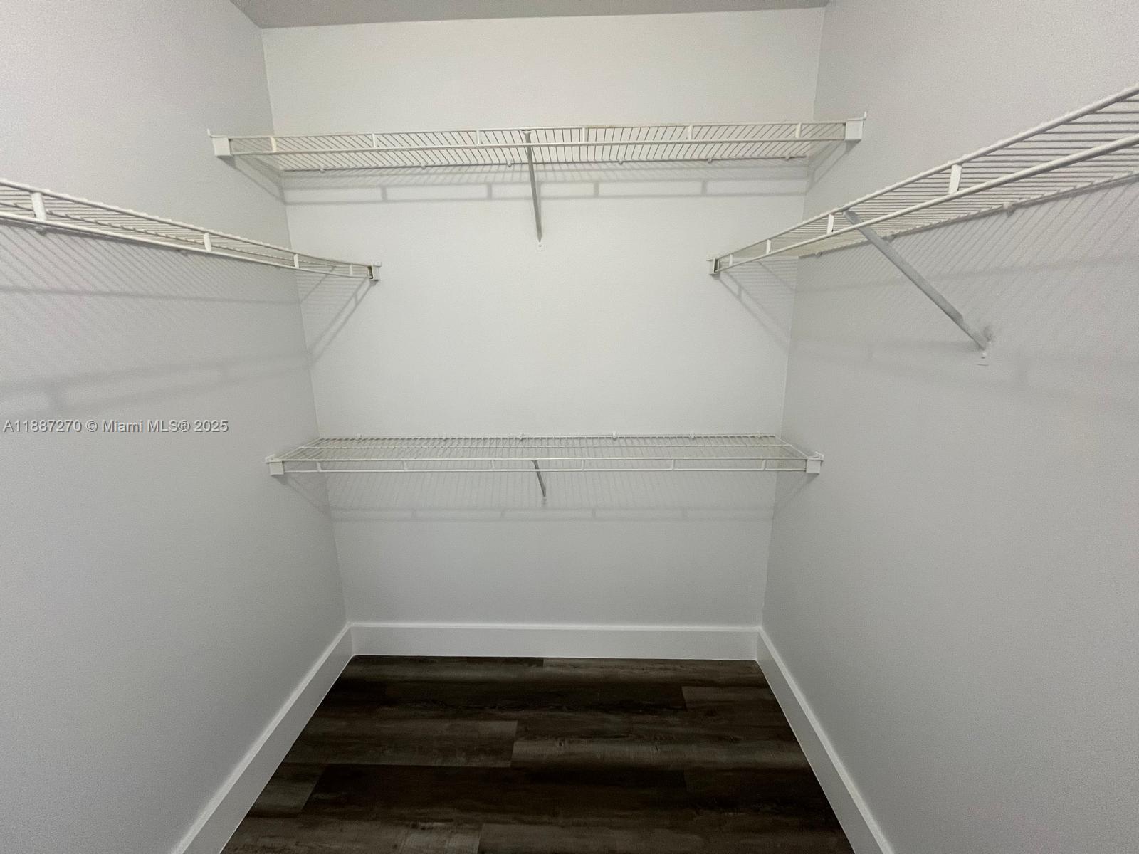 655 Southwest 111th Way, Unit 308 Pembroke Pines, FL 33025 - Photo 20 of 42 a view of a room with racks on the wall