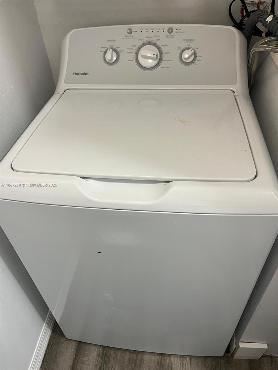 655 Southwest 111th Way, Unit 308 Pembroke Pines, FL 33025 - Photo 26 of 42 a close up view of washer and dryer