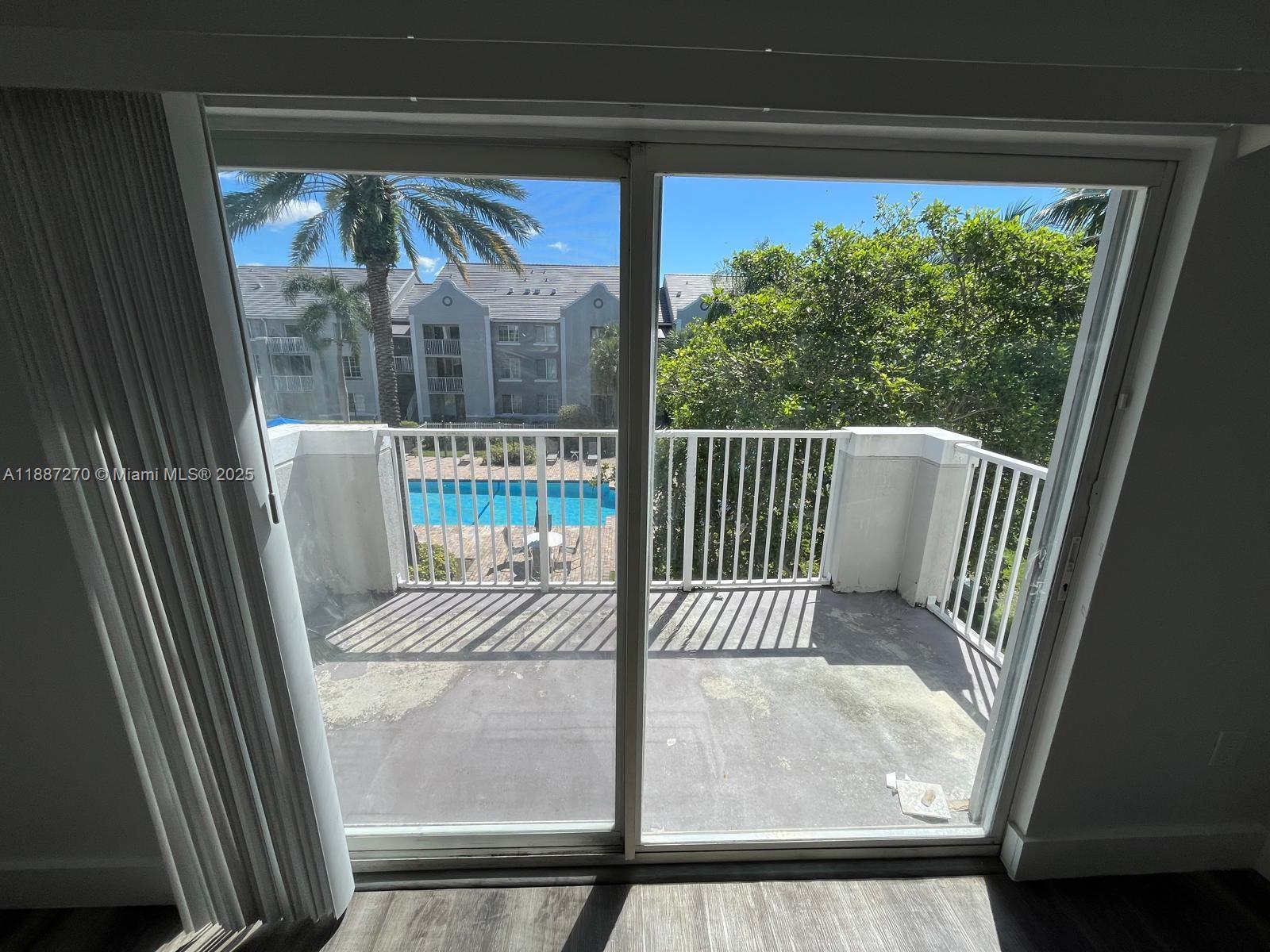 655 Southwest 111th Way, Unit 308 Pembroke Pines, FL 33025 - Photo 28 of 42 a view of a porch
