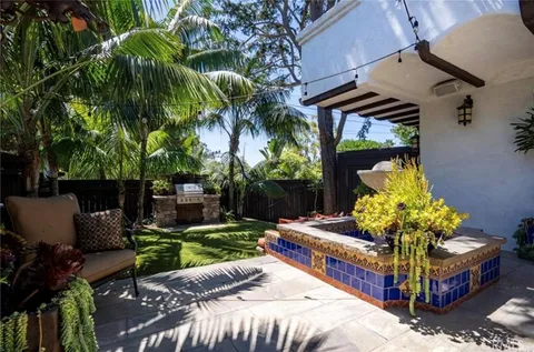 a house view with a outdoor space