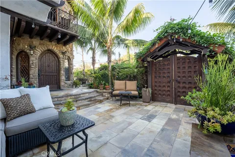a kitchen with stainless steel appliances granite countertop a stove and a refrigerator