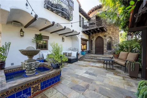 a kitchen with stainless steel appliances granite countertop a stove and a sink