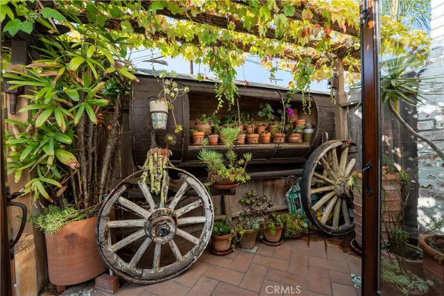 a bedroom with a bed and glass window