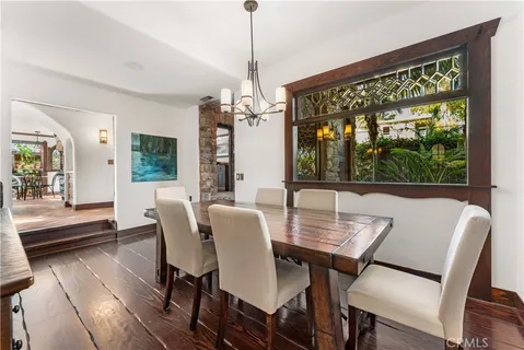 a view of yard from deck having patio