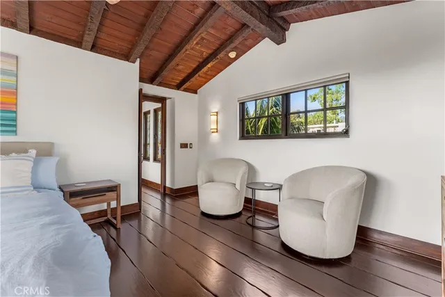 a view of a chairs and table on the patio