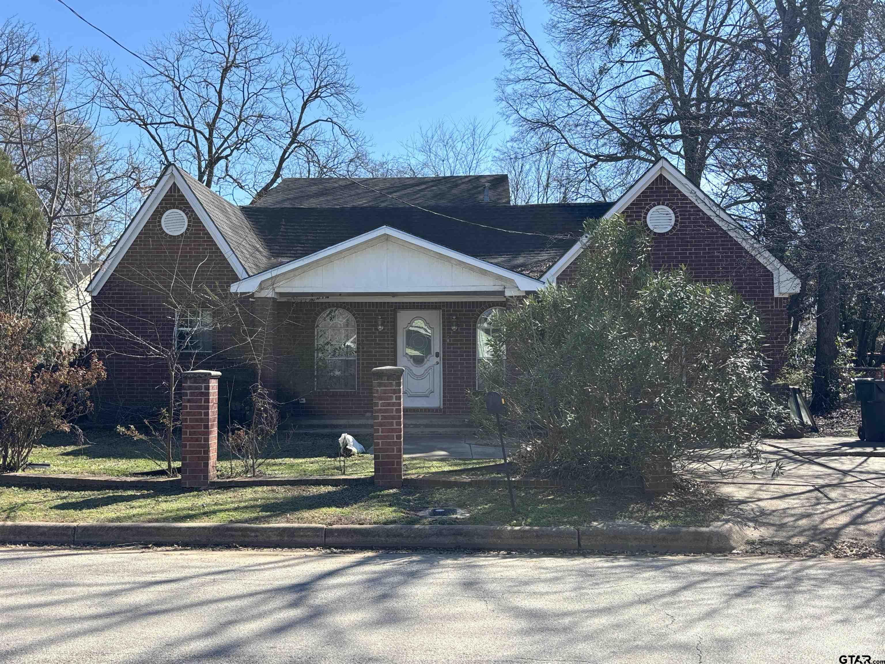 421 East Rosedale Street Tyler, TX 75702 - Photo 14 of 14 a front view of a house with a yard