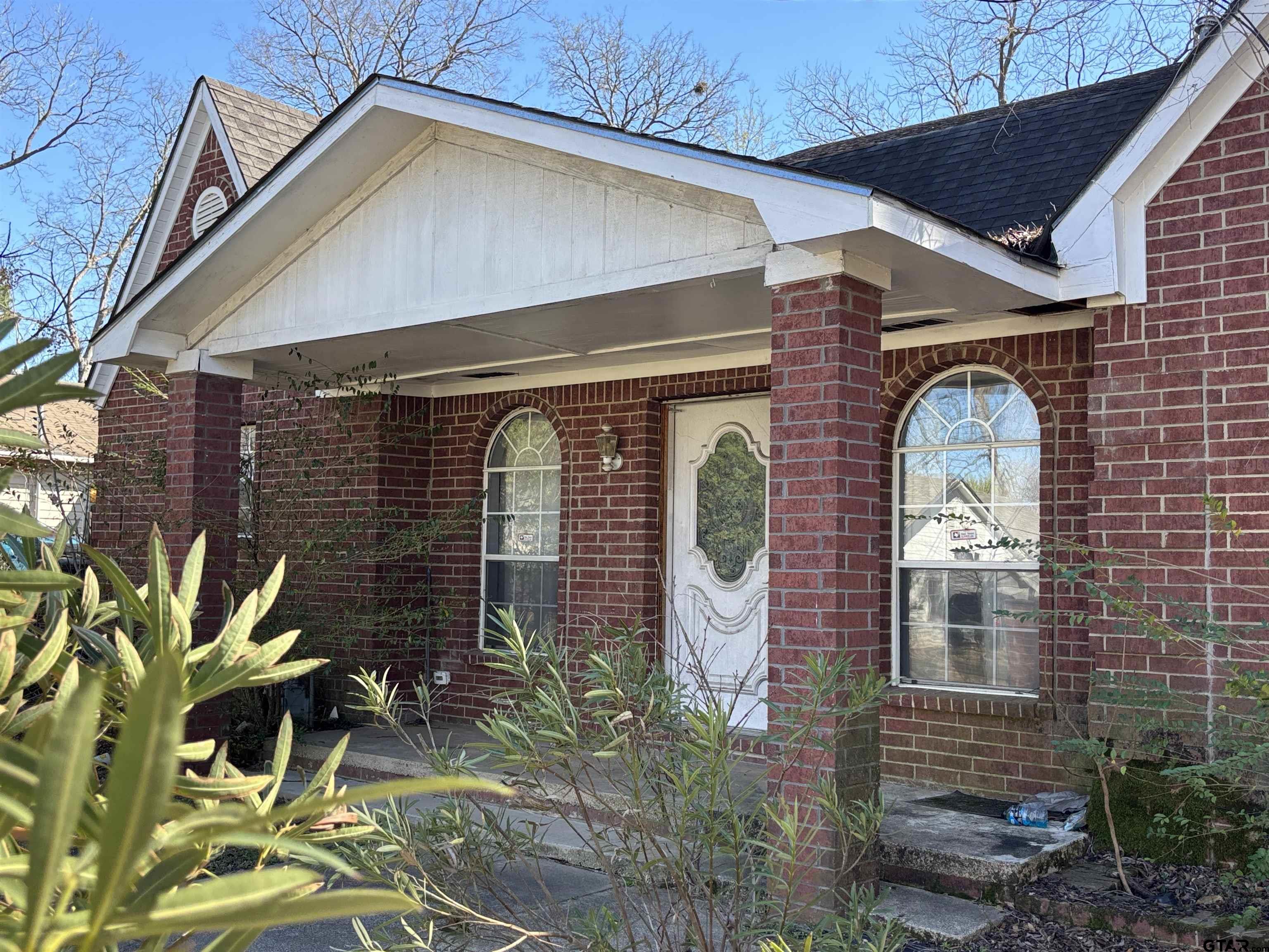 421 East Rosedale Street Tyler, TX 75702 - Photo 2 of 14 a front view of a house with a yard