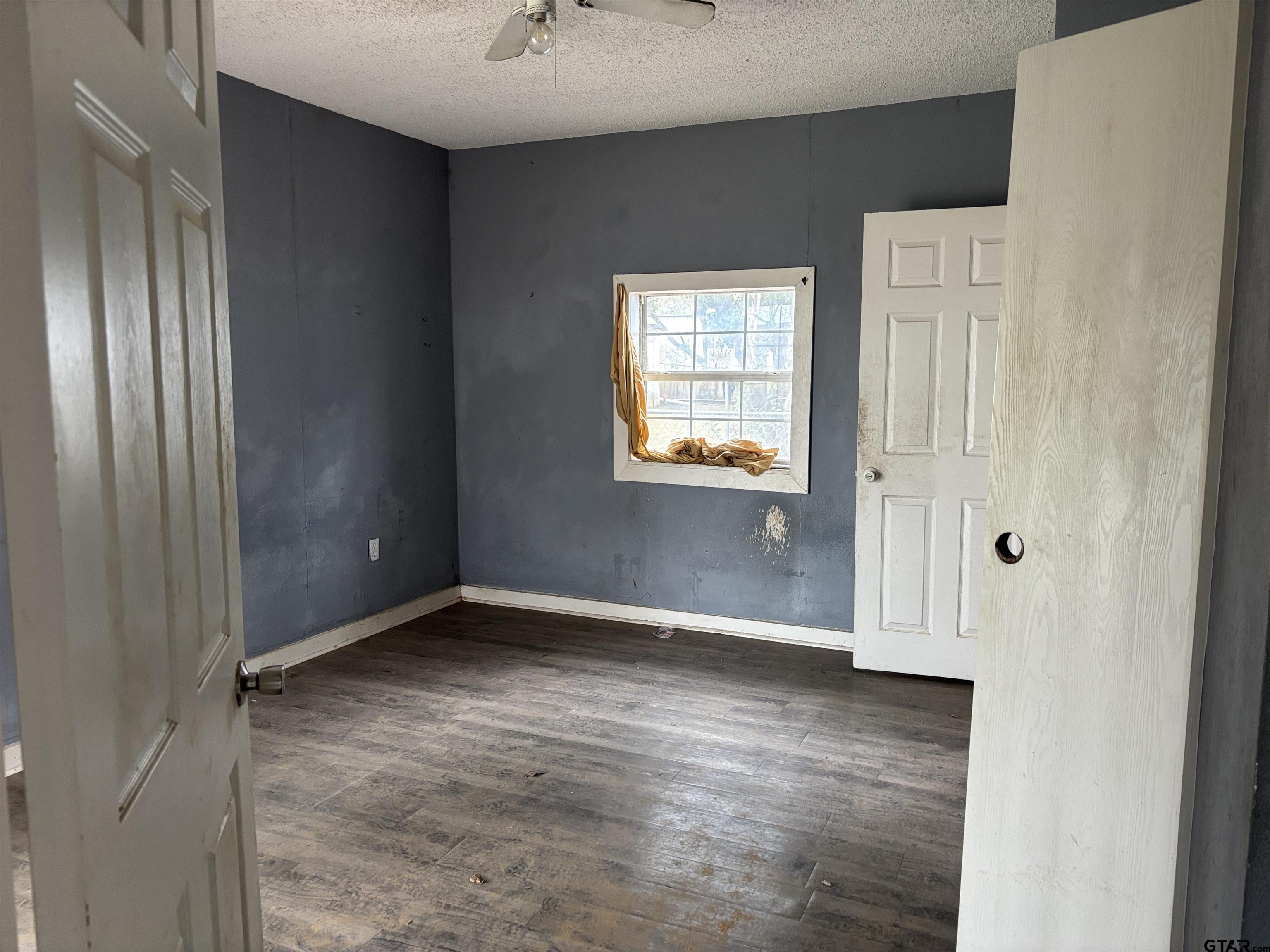 421 East Rosedale Street Tyler, TX 75702 - Photo 6 of 14 an empty room with windows