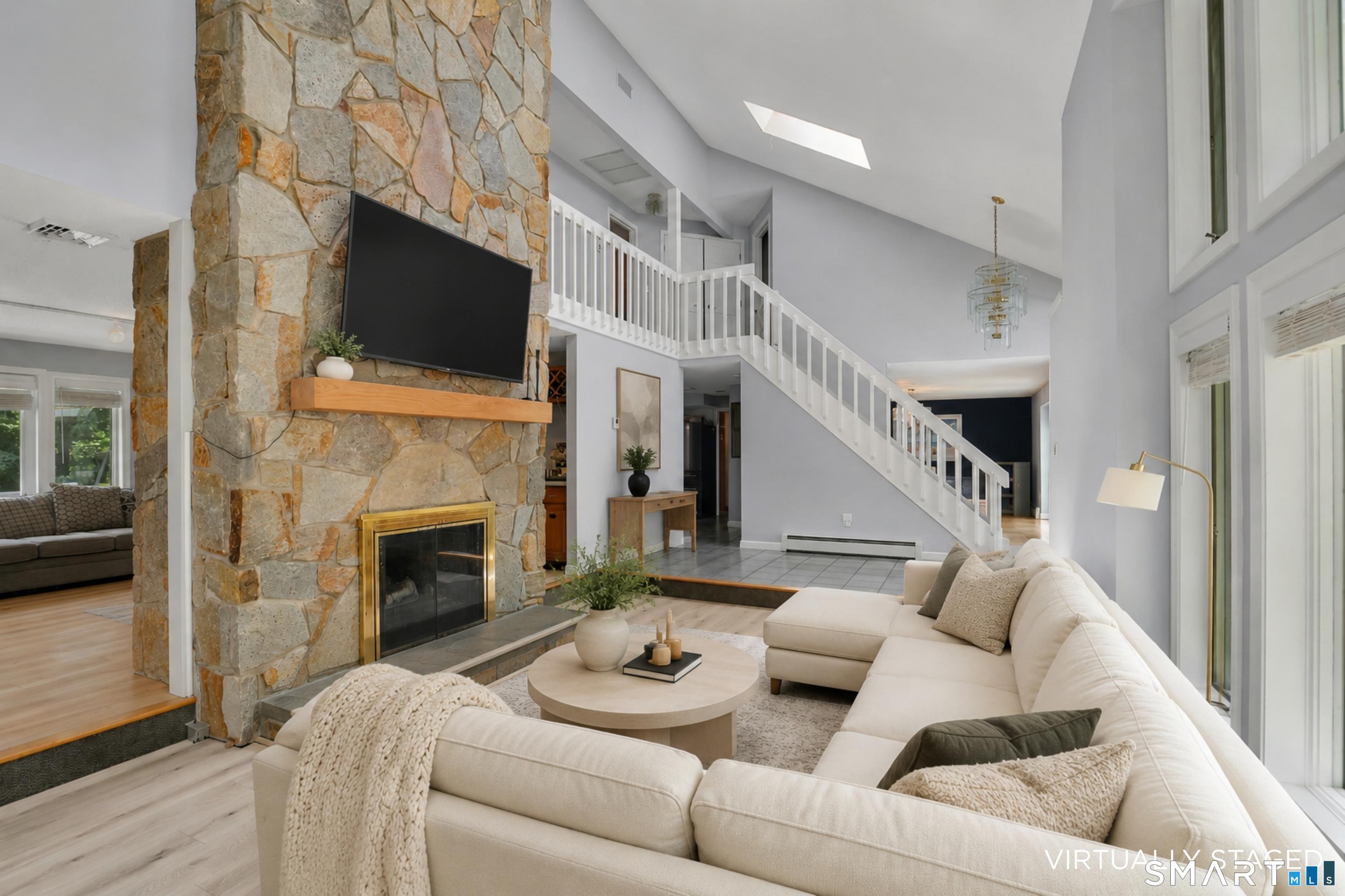 8 Pond View Road Bolton, CT 06043 - Photo 4 of 39 Large windows and skylights let in so much natural light.