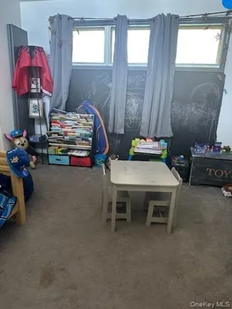 a utility room with a window dryer and washer