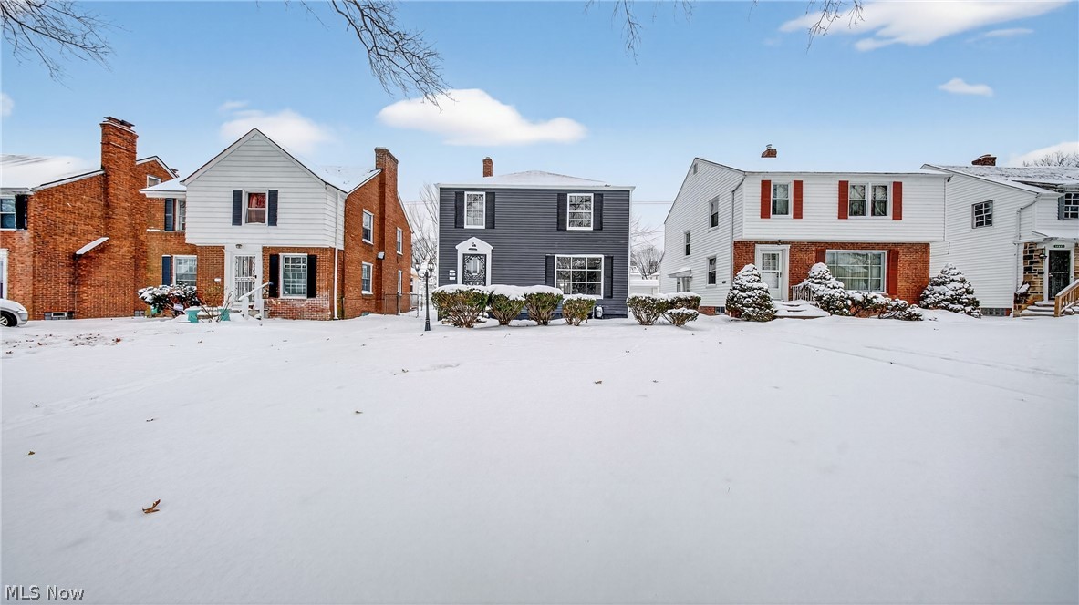 16811 Invermere Avenue Cleveland, OH 44128 - Photo 2 of 47 View of snow covered rear of property
