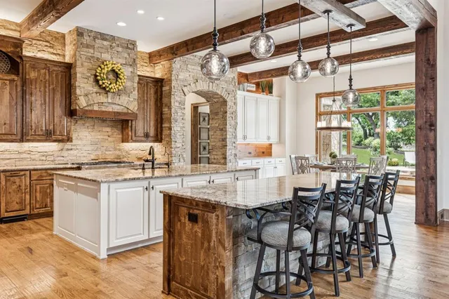a living room with furniture and a book shelf