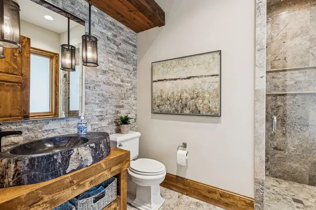 a living room with couch and a rug