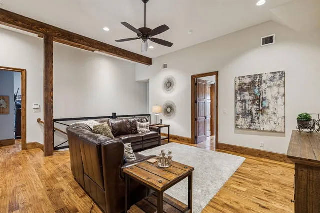 a kitchen with a sink and large window