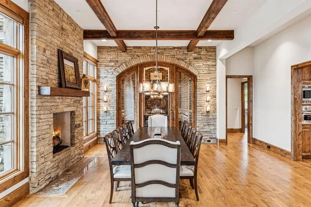 a view of a livingroom with furniture window and wooden floor