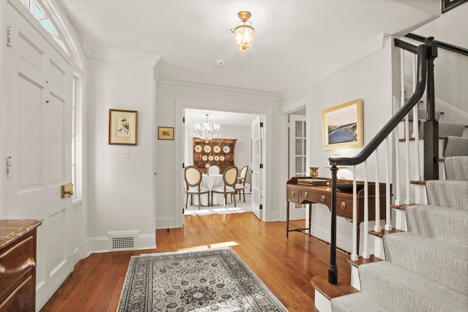 51 Logan Road New Canaan, CT 06840 - Photo 3 of 39 a living room with wooden floor and a rug
