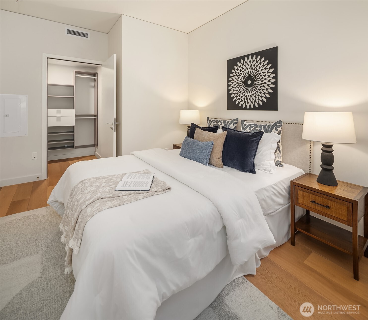 121 Stewart Street, Unit 1803 Seattle, WA 98101 - Photo 22 of 35 a bedroom with bed and window